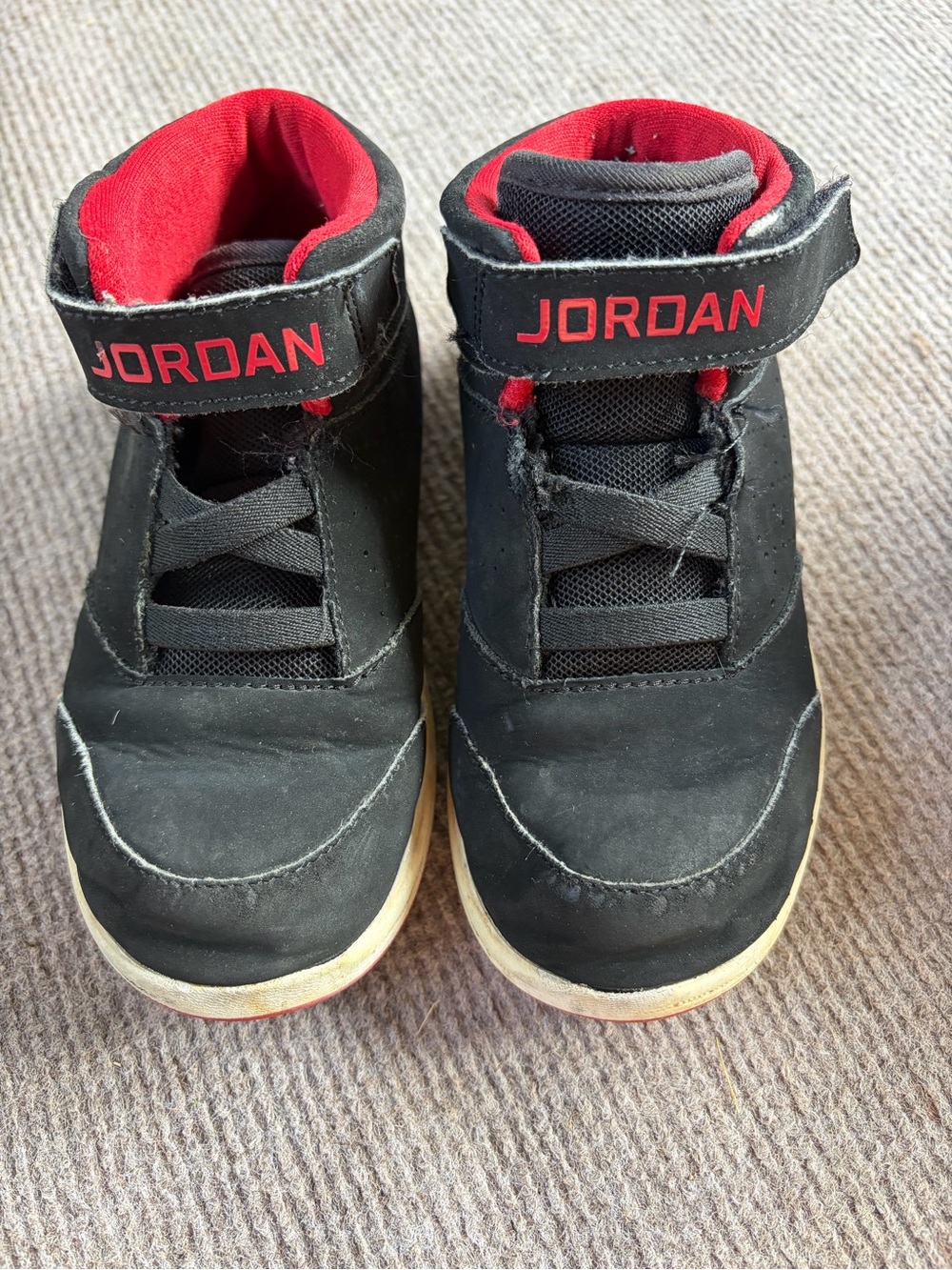 Jordan Kids Black and Red High Top Sneakers with Strap Detail